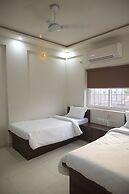 Yuvi Grand Residency
