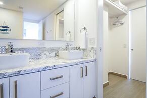 Panoramic Beach Front Condo Verano 1703