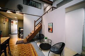 Swing & Pillows at 87 Chulia St