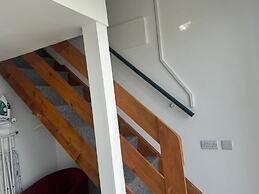 Kick Back Relax Stylish Space With Balcony