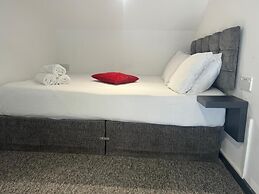 Kick Back Relax Stylish Space With Balcony