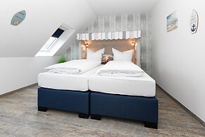 Gemuetliche Ferienwohnung Obergeschoss, Bensersiel