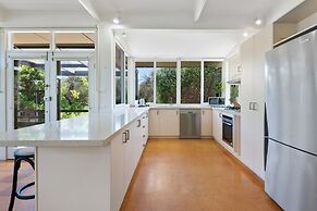 Spacious Coastal 4-bed Steps From the Sand