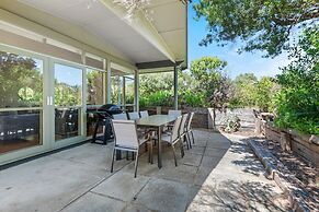 Spacious Coastal 4-bed Steps From the Sand