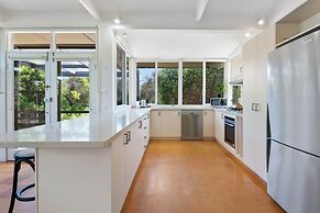Spacious Coastal 4-bed Steps From the Sand
