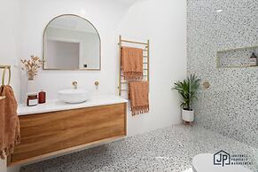 Elegant Beachside Retreat With Luxurious Amenities