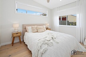 Elegant Beachside Retreat With Luxurious Amenities