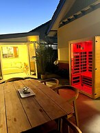 Wellness Escape: 1-bed Home + Studio & Sauna