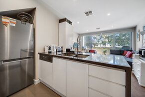 Tranquil Apartment in Green, Well Connected Suburb