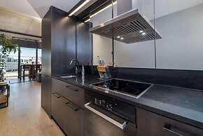 Stunning 1BR Apartment With Water Views