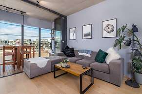 Stunning 1BR Apartment With Water Views