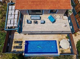 Villa Elvin in Slamlar K y
