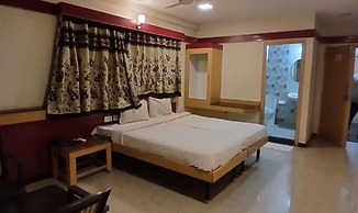 Fabhotel Sri Sai Guru Comforts