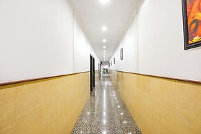 Fabhotel Golden Palm