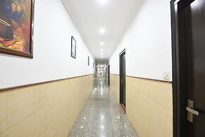 Fabhotel Golden Palm