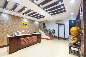 Fabhotel Golden Palm