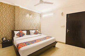 Fabhotel Golden Palm