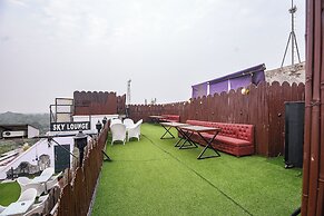 Fabhotel Happy Residency