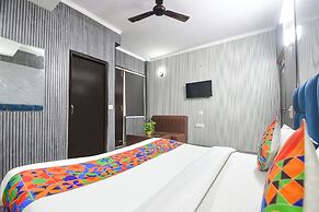 Fabhotel Happy Residency