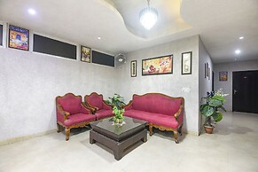 Fabhotel Happy Residency