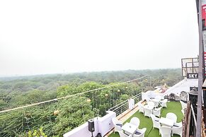 Fabhotel Happy Residency