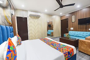 Fabhotel Happy Residency
