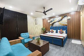 Fabhotel Happy Residency
