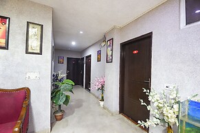 Fabhotel Happy Residency