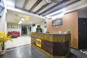 Fabhotel Happy Residency