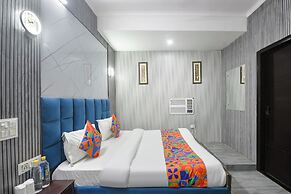 Fabhotel Happy Residency