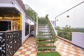 Fabhotel Happy Residency