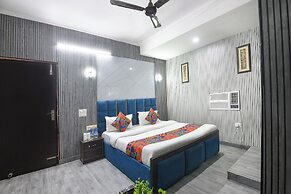 Fabhotel Happy Residency