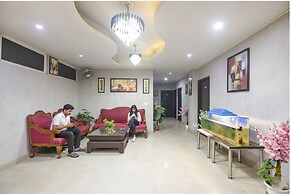 Fabhotel Happy Residency