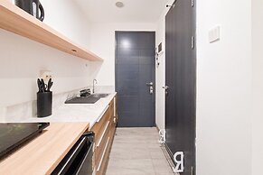 Modern And Bright Studio Apartment Collins Boulevard