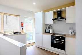 Modern Comforts 4 Bedroom Home for Work & Play