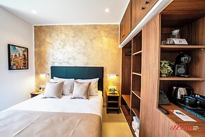 Ta  Guzeppi Boutique Stays by Zzzing
