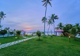 Ashtamudi Lake Villa by VOYE HOMES