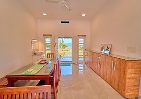 Ashtamudi Lake Villa by VOYE HOMES