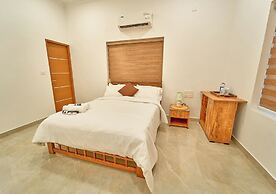 Ashtamudi Lake Villa by VOYE HOMES