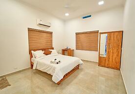 Ashtamudi Lake Villa by VOYE HOMES