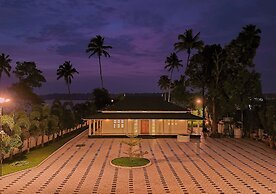 Ashtamudi Lake Villa by VOYE HOMES