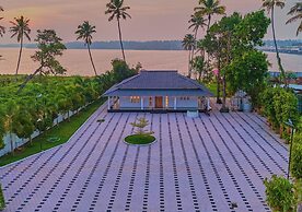 Ashtamudi Lake Villa by VOYE HOMES