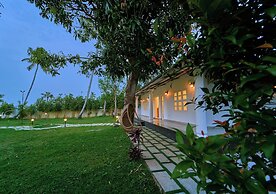 Ashtamudi Lake Villa by VOYE HOMES