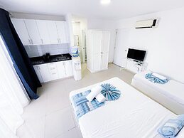 DELUXE STUDIOS HOTEL POOL AND BEACH