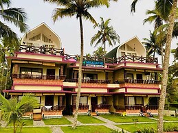 Maadathil cottages & Beach resort