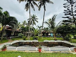 Maadathil cottages & Beach resort