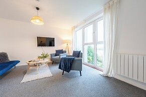 Modern 2BR Apartment with Water Views