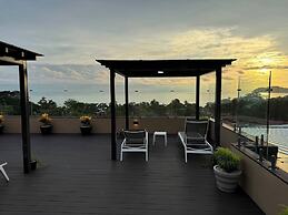 Modern Haven With Forest Views and Ocean Breeze