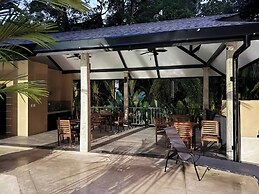 Modern Haven With Forest Views and Ocean Breeze