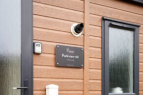 Host Stay Woodpecker Lodge